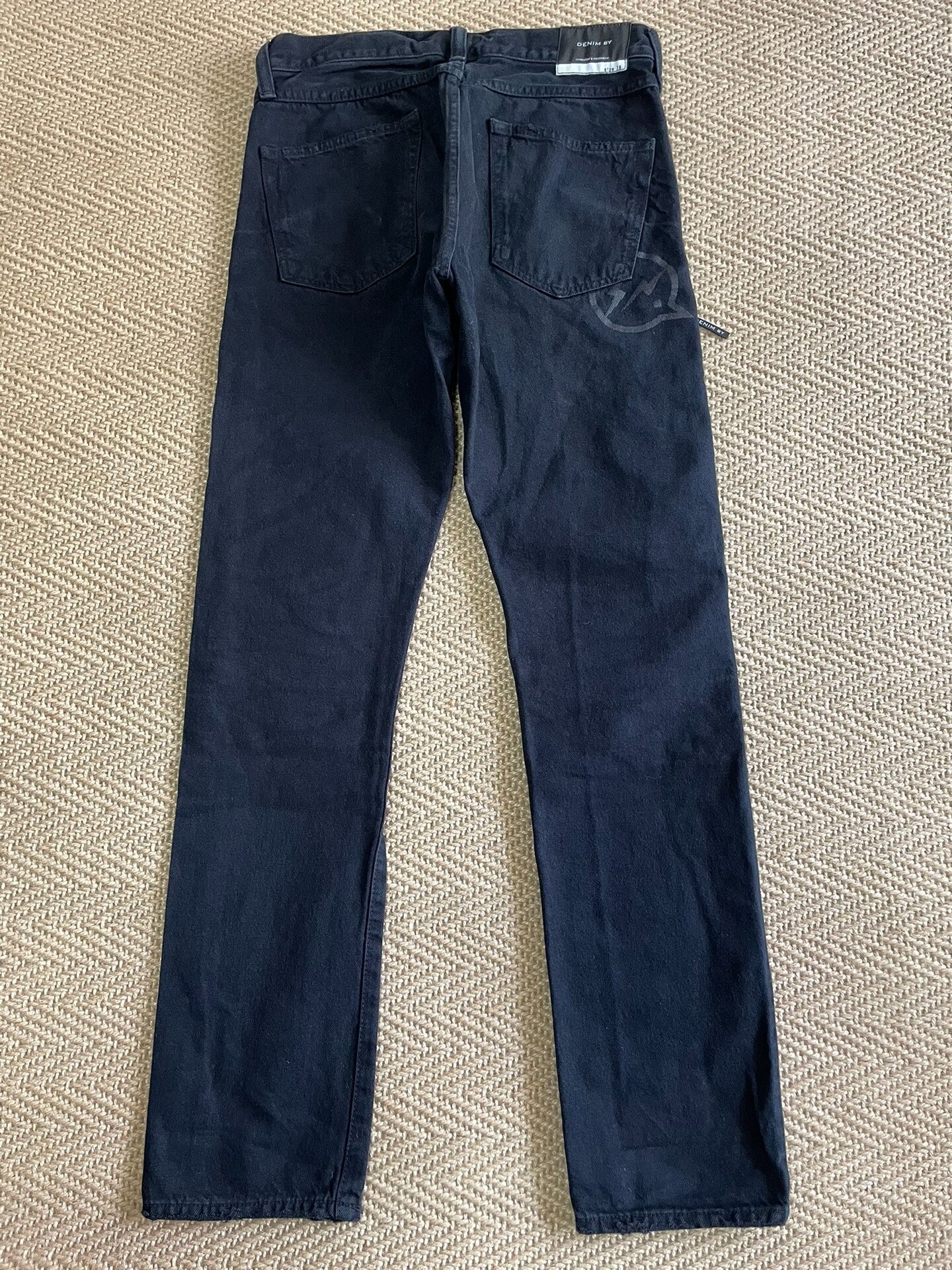 Vanquish & Fragment Distressed Washed Denim Pants — front