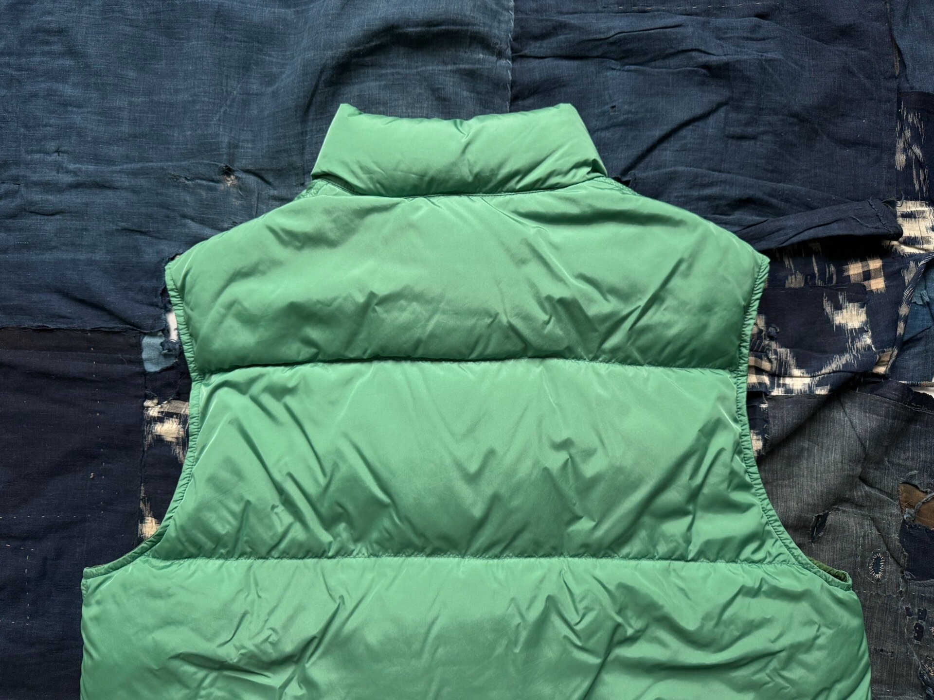 VISVIM 22AW WALKER DOWN VEST — label