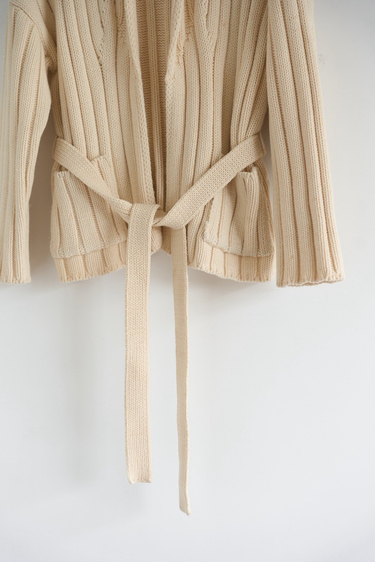 Auralee Belted Wool Knit Coat — label