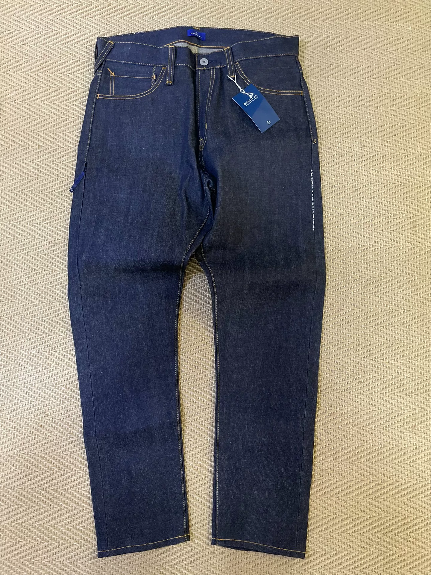 Vanquish & Fragment Embroidered Lightning Raw Denim Jeans — front
