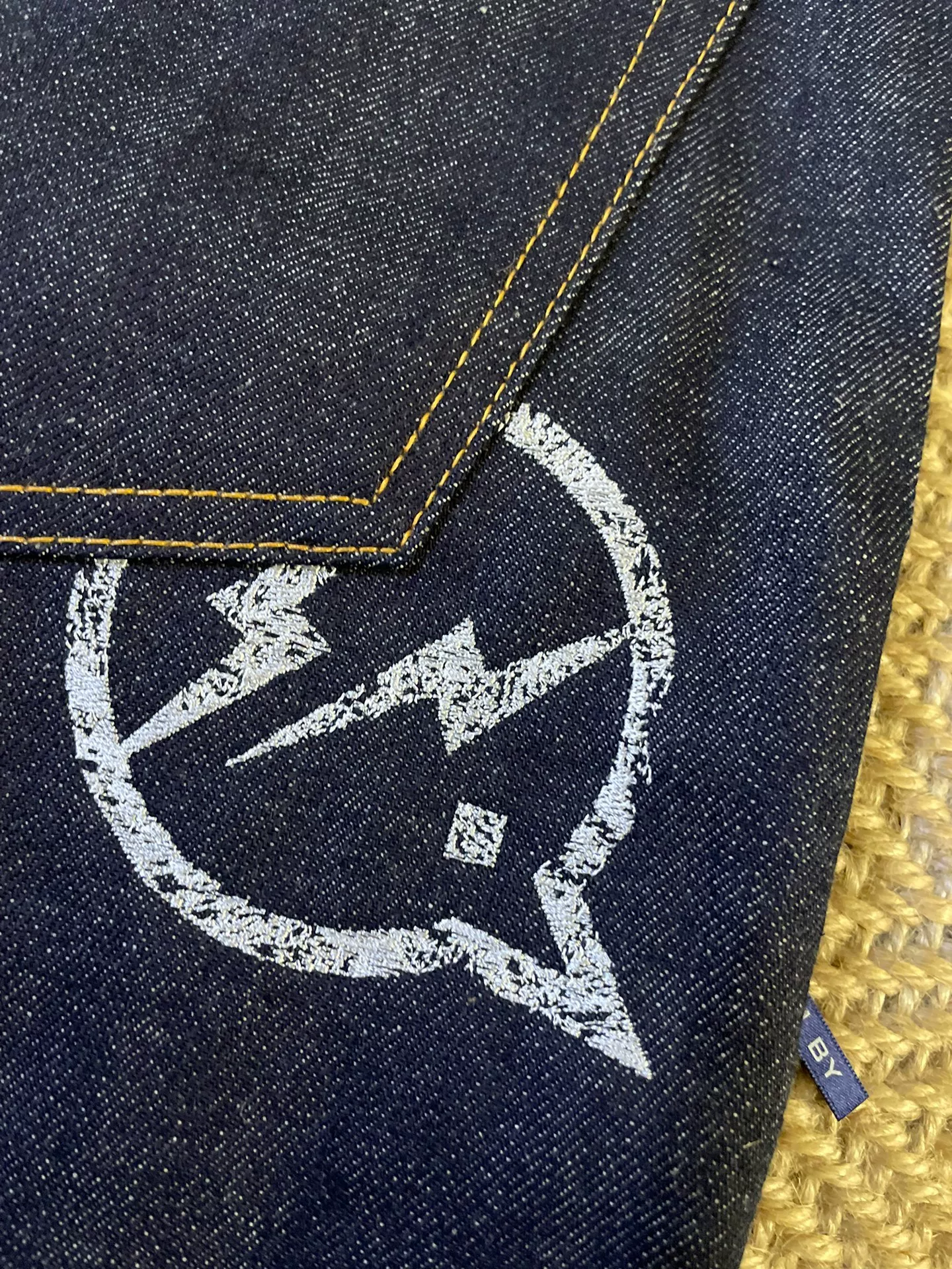 Vanquish & Fragment Embroidered Lightning Raw Denim Jeans — back
