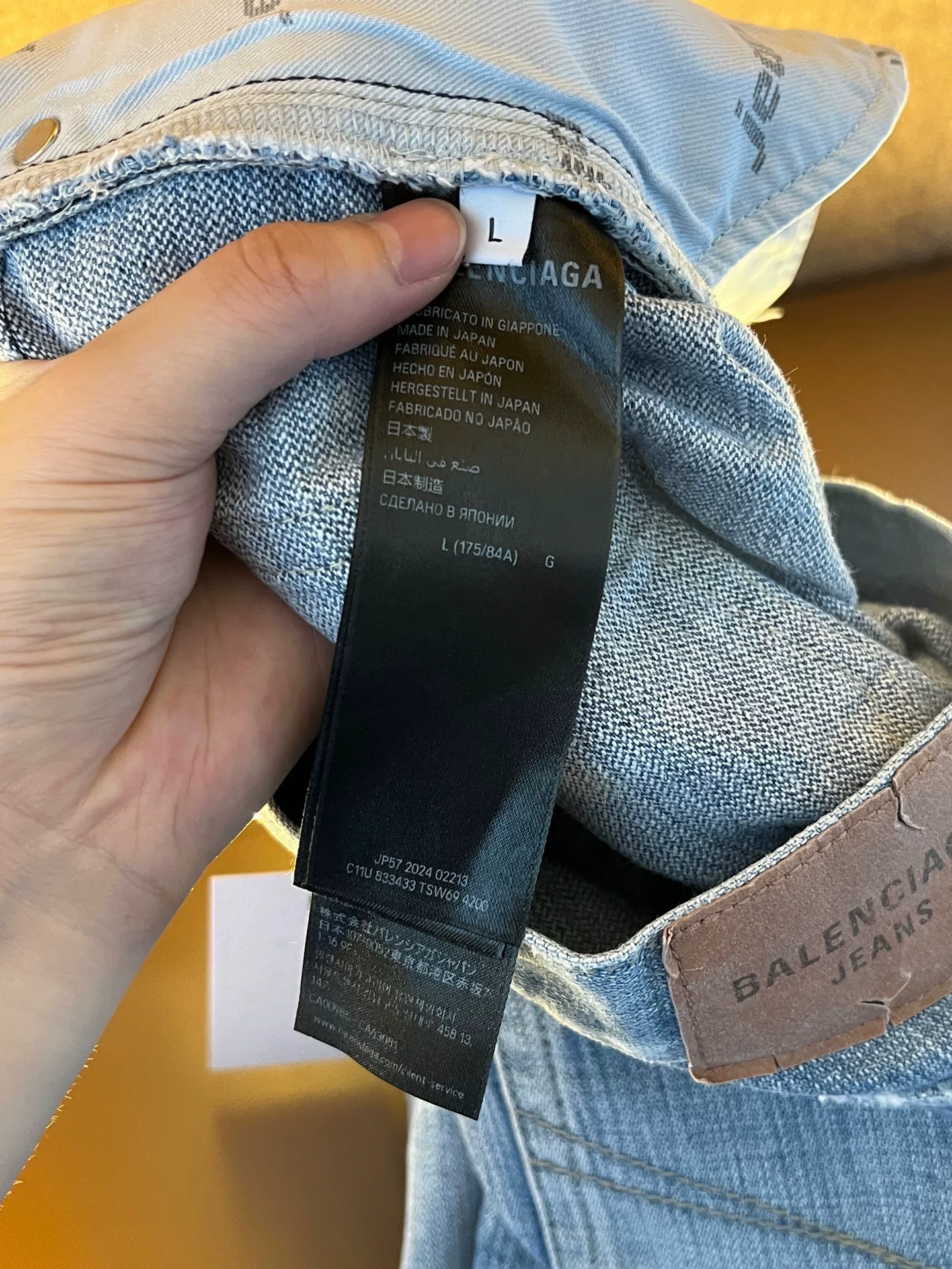 Balenciaga Low-Waist Washed Straight Jeans — label