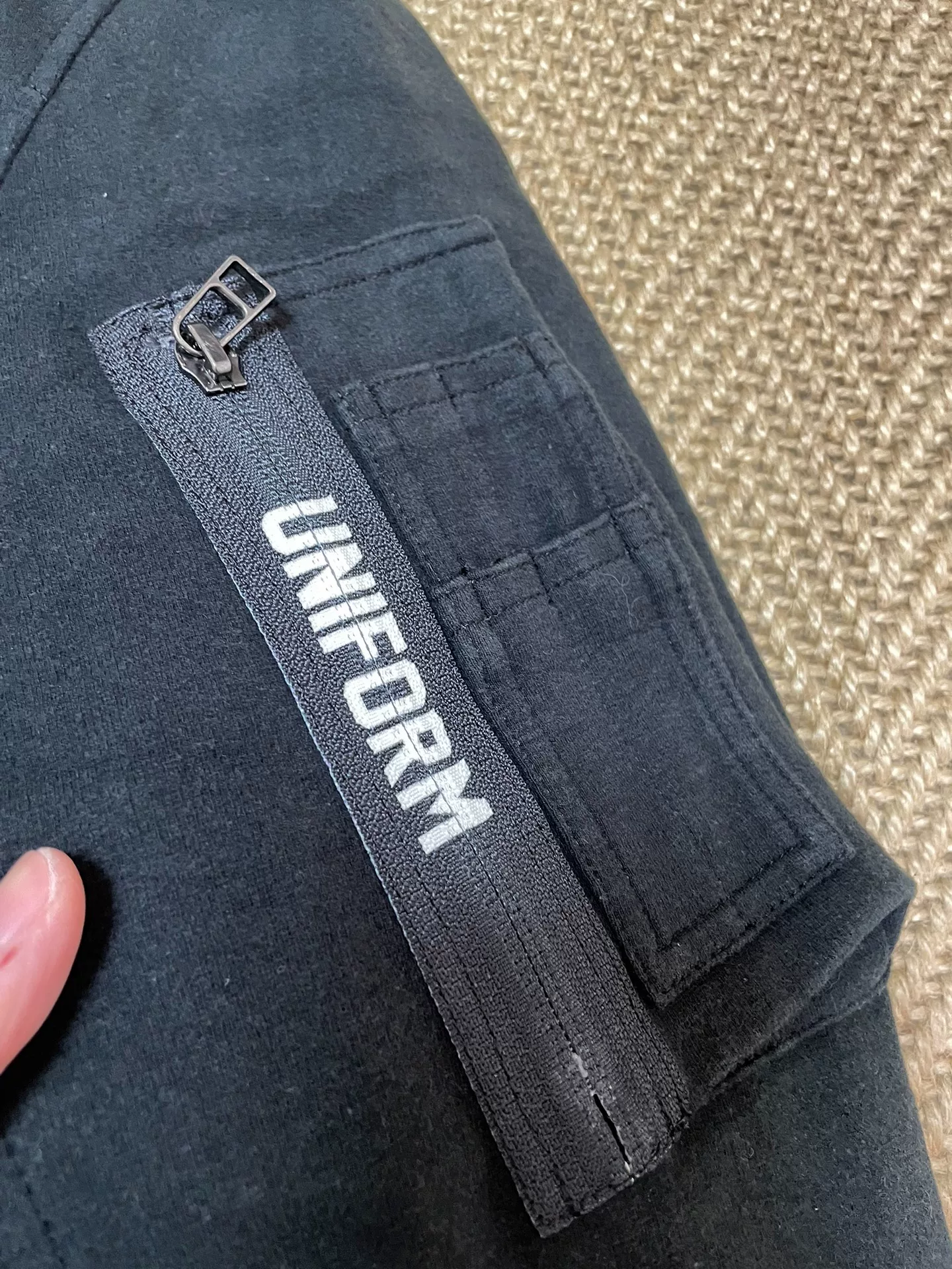 Uniform Experiment Reversible MA-1 Jacket — label