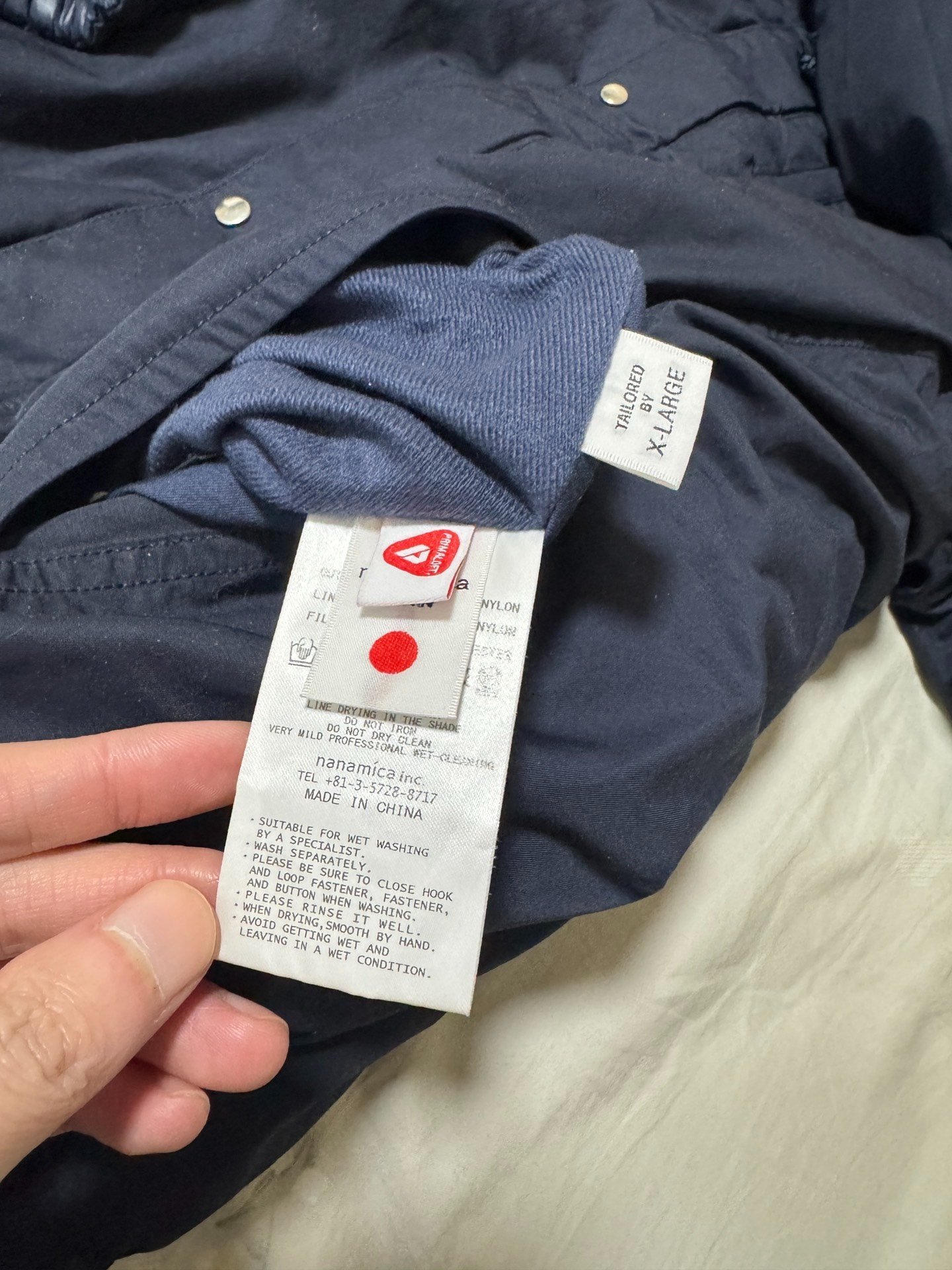 nanamica Reversible Waterproof Jacket — label