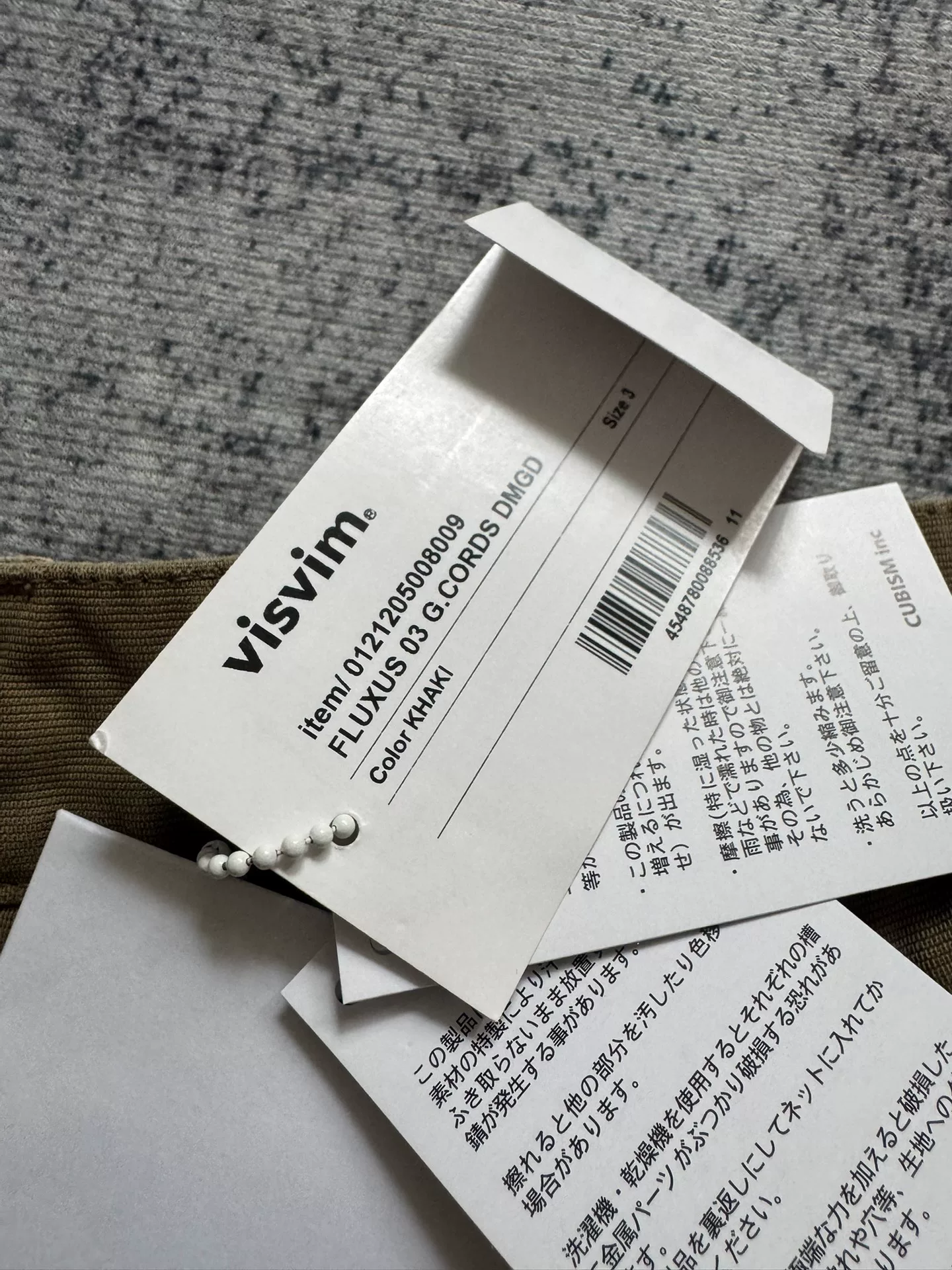 VISVIM 23SS FLUXUS 03 DMGD (DRY PIQUE) — label
