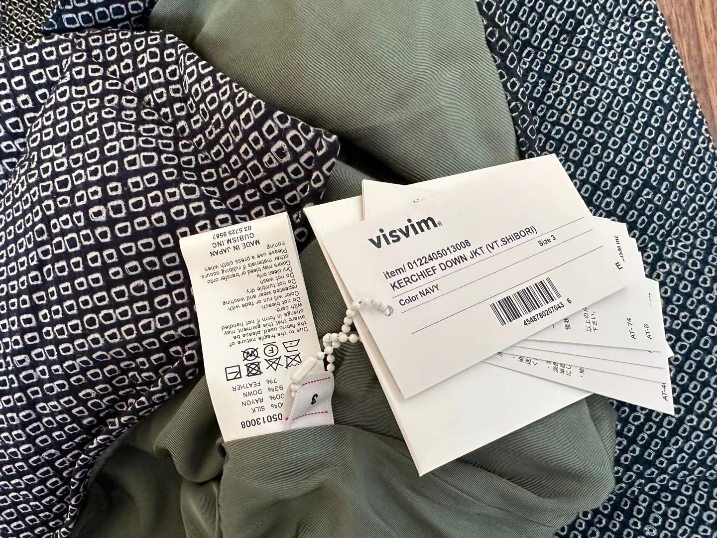 VISVIM Shibori Down Jacket — label