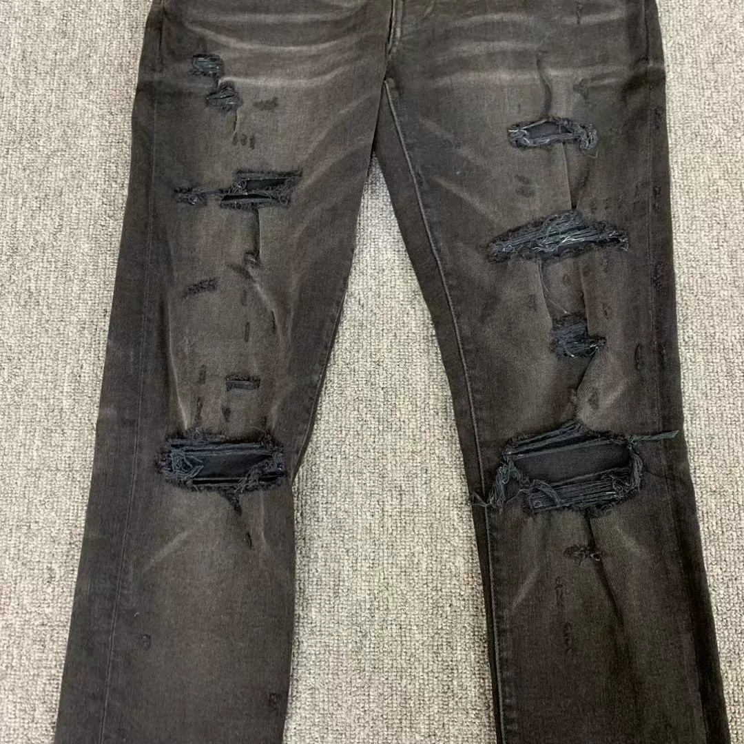 Amiri Black Distressed Knee Jeans — label