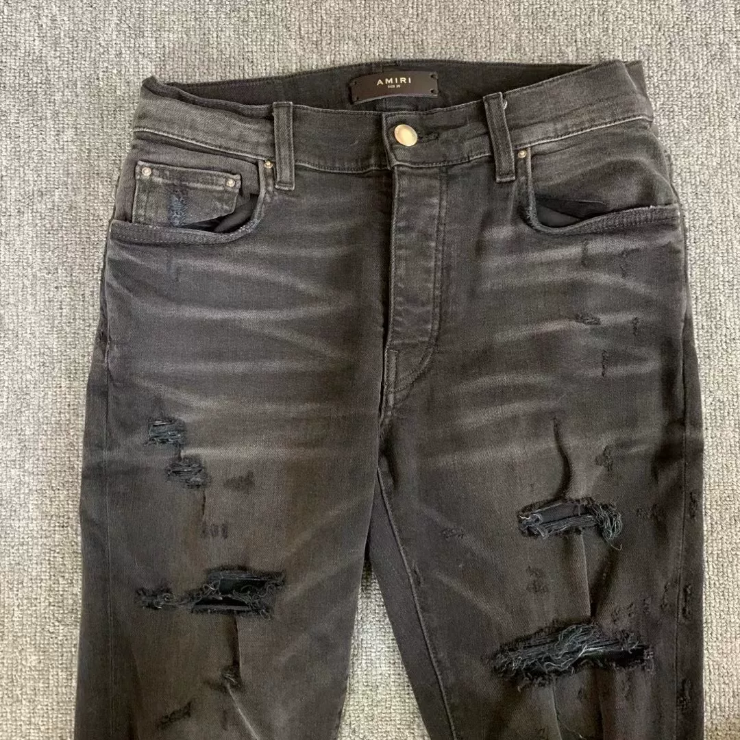 Amiri Black Distressed Knee Jeans — front