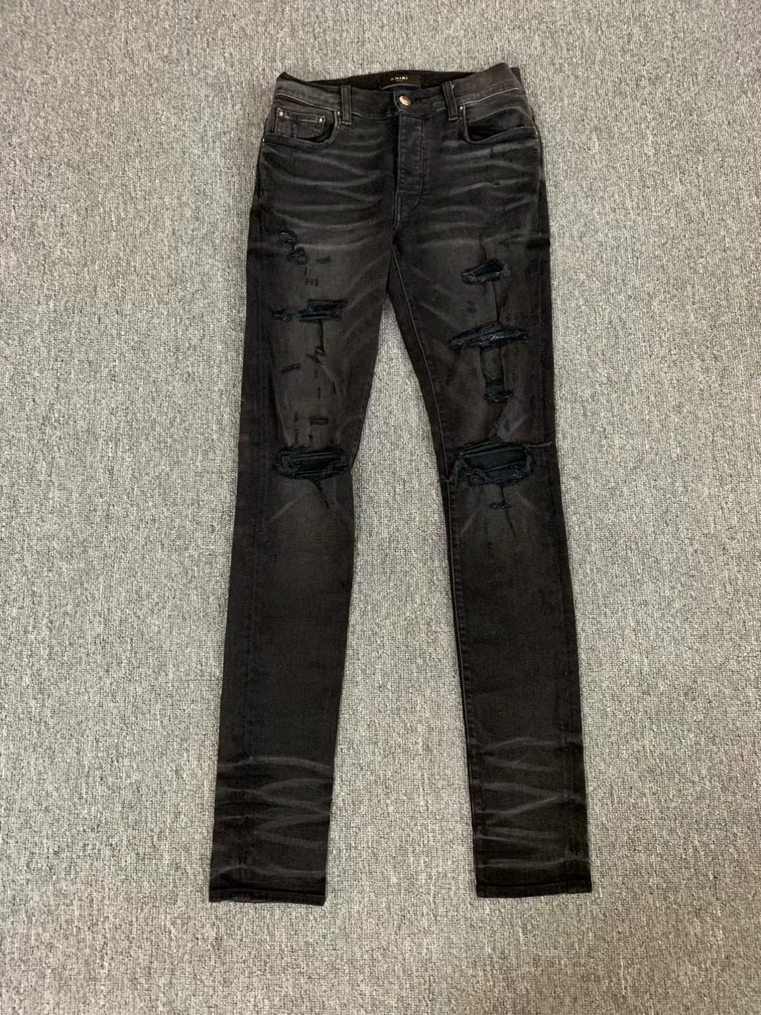Amiri Black Distressed Knee Jeans