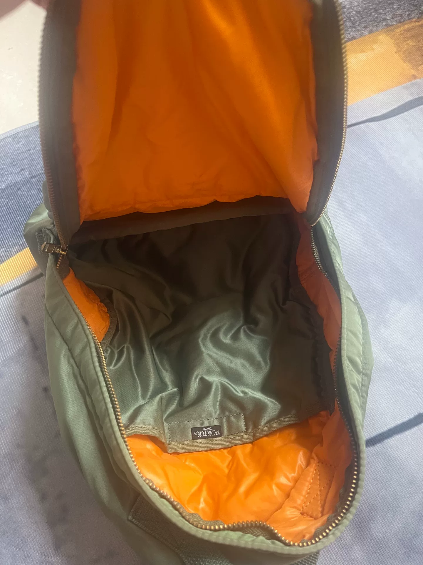 Green Porter Tanker Backpack — label