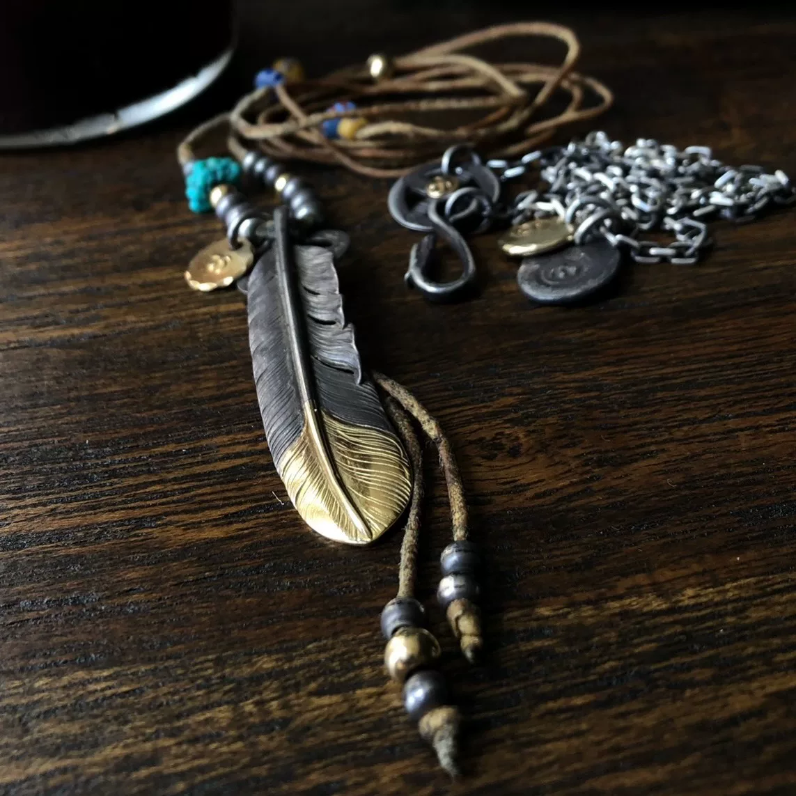 Goros Feather Set Gold Silver — front