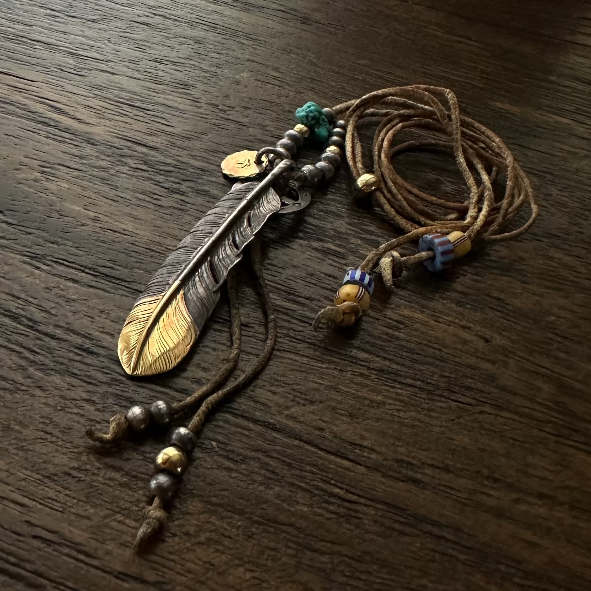 Goros Feather Set Gold Silver