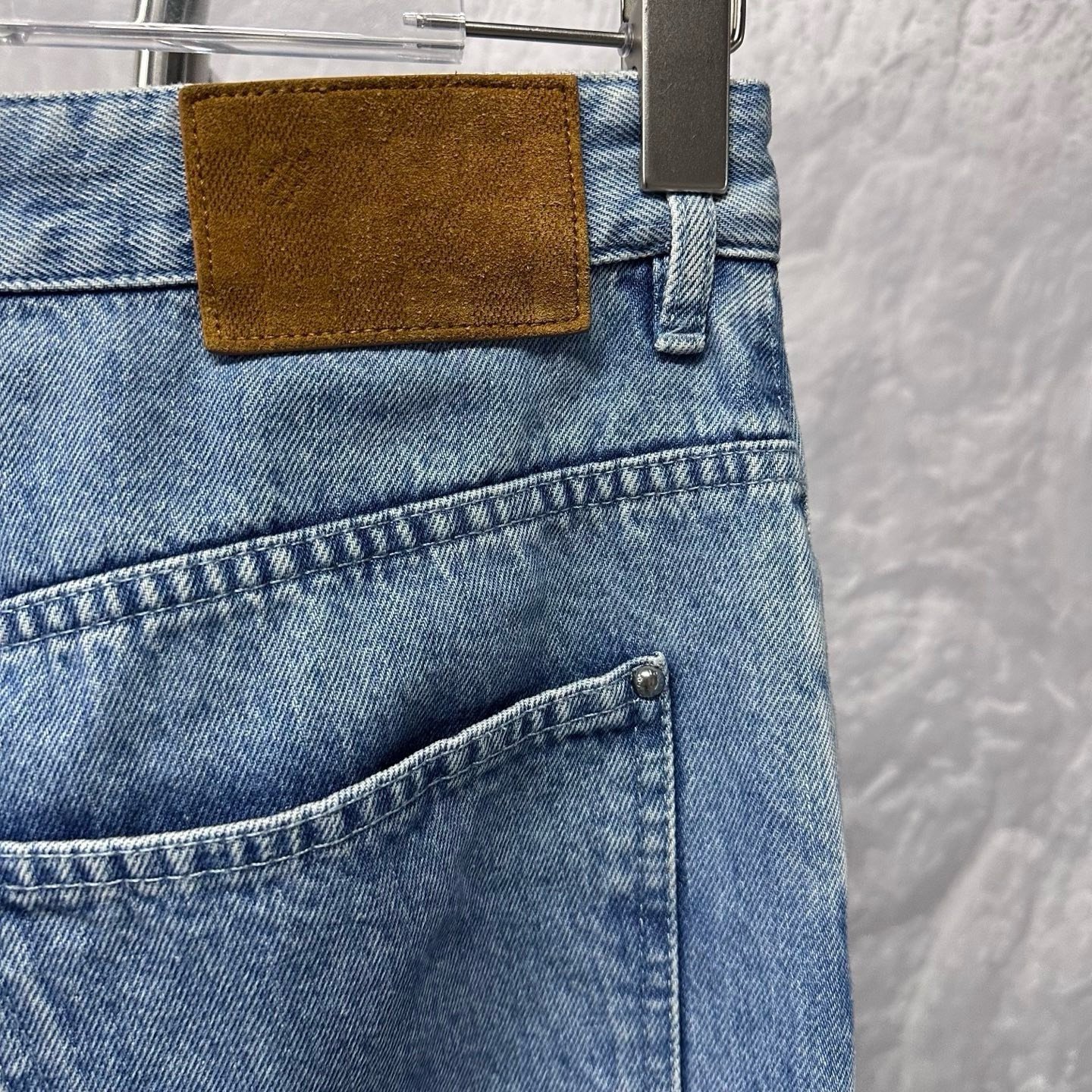 Louis Vuitton SS25 Distressed Logo Denim Pants — detail