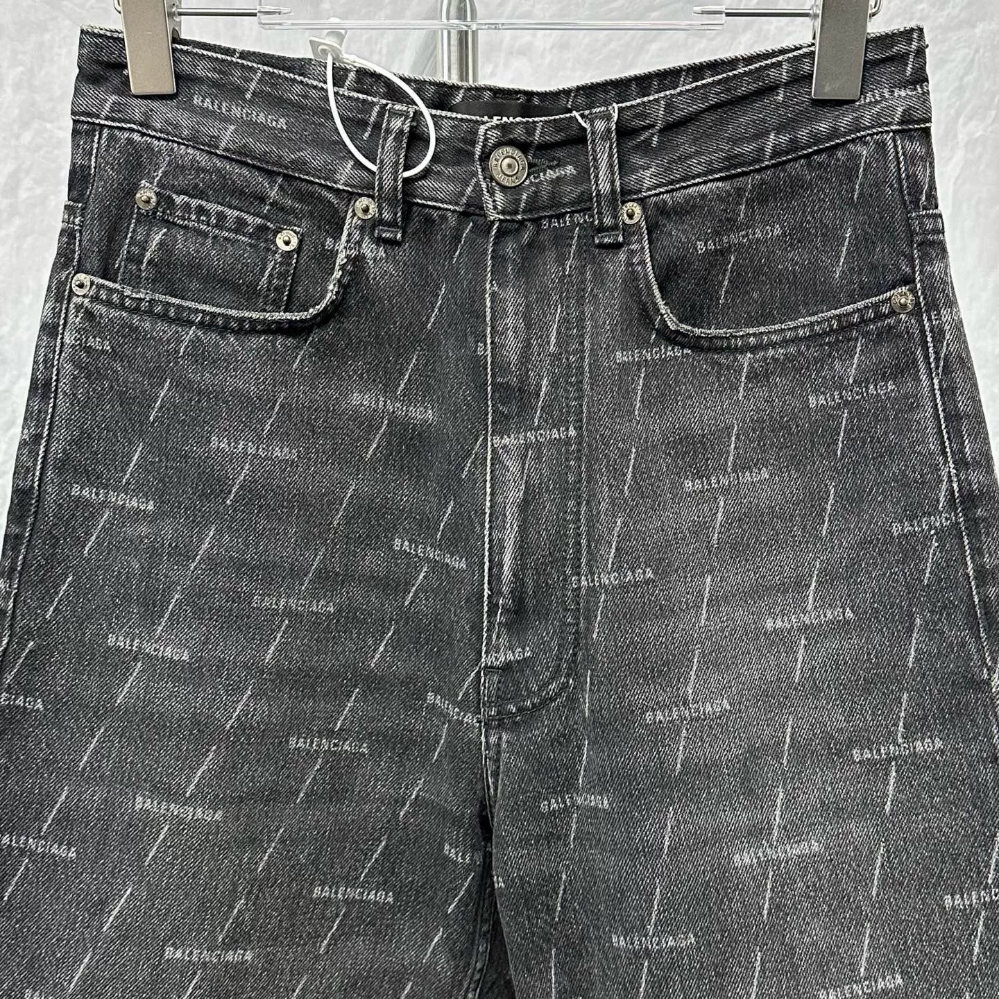 Balenciaga All-Over Print Denim Jeans — front