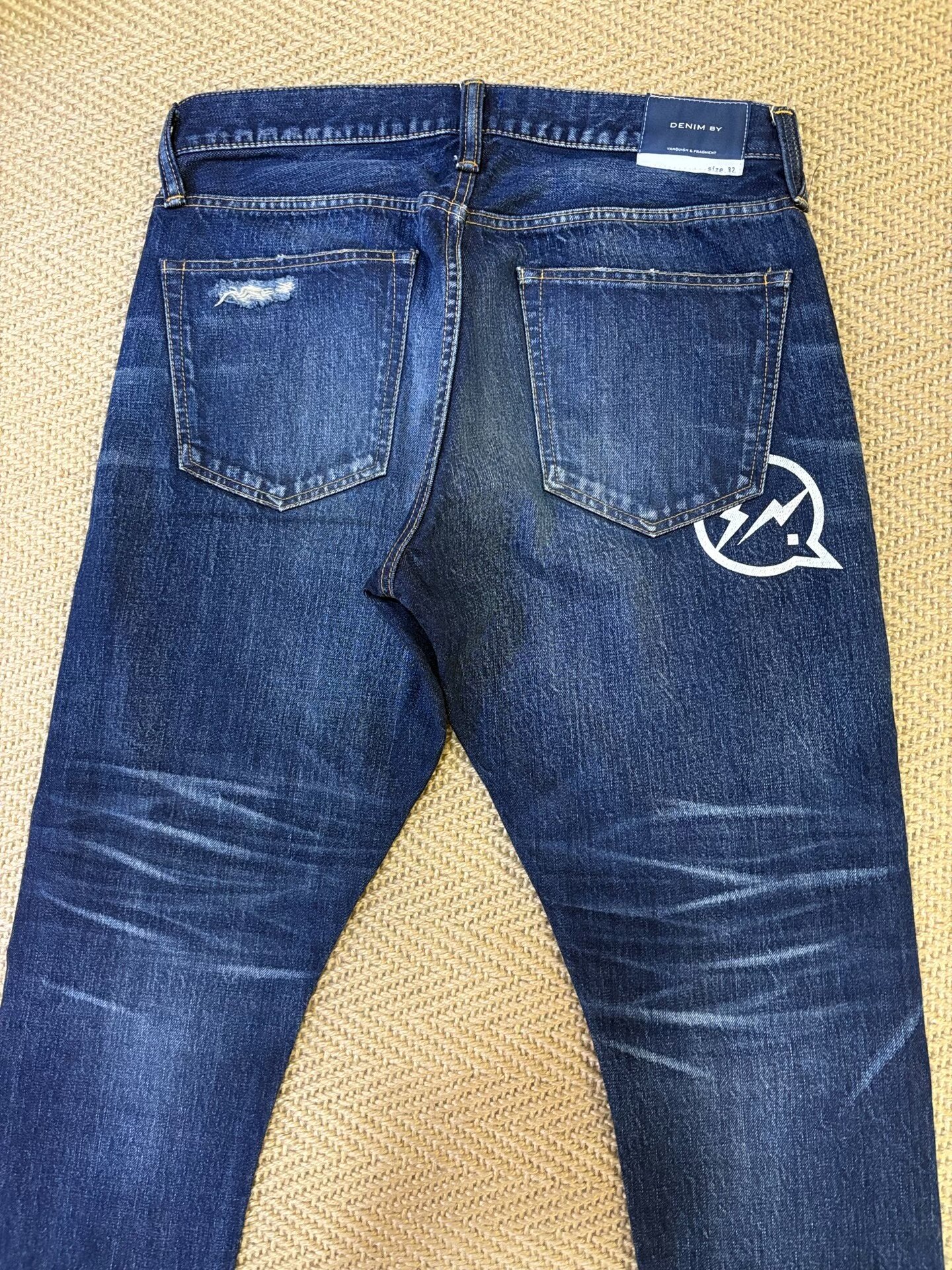 Vanquish & Fragment Washed Cropped Jeans — label