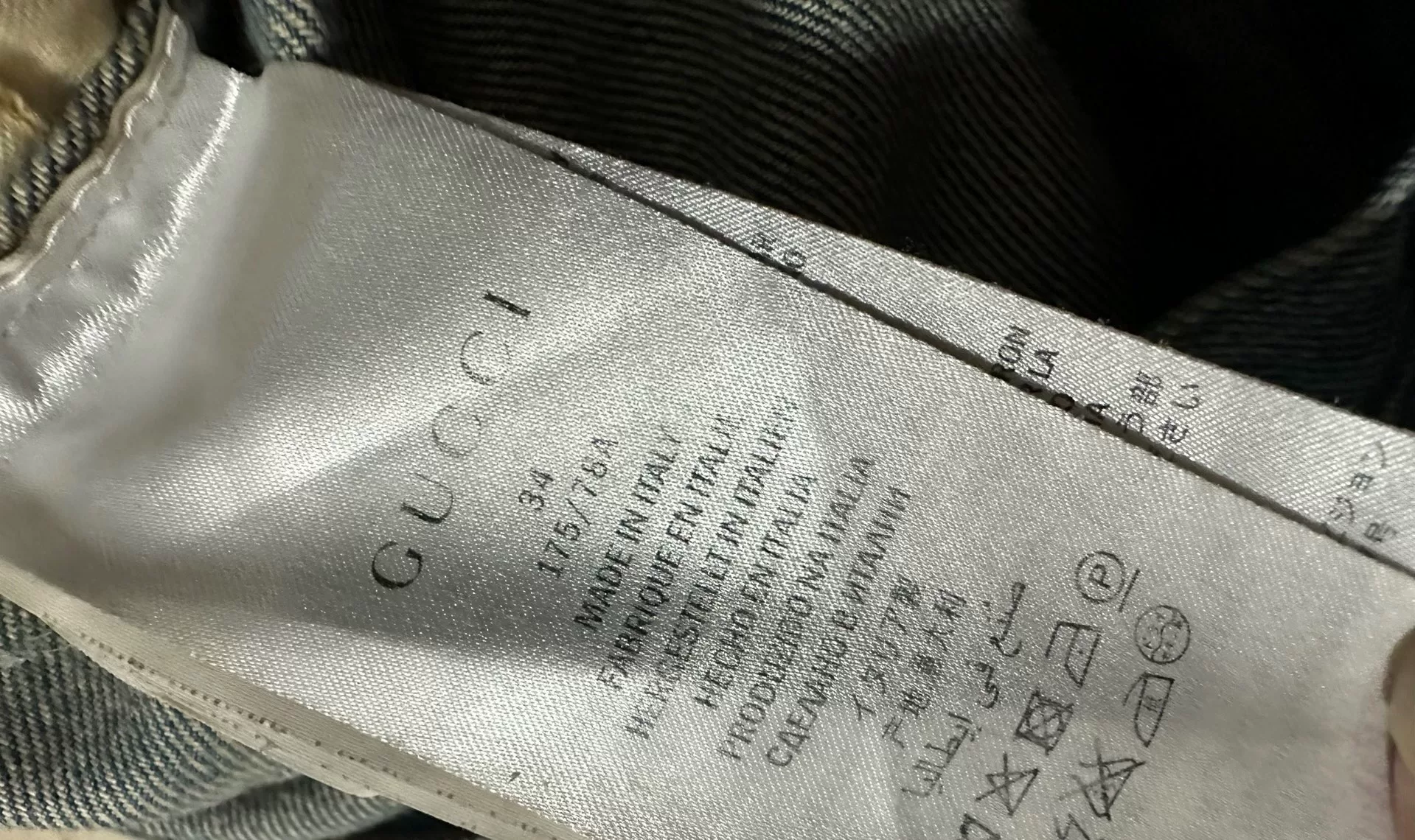 Gucci Coral Snake Washed Jeans — label