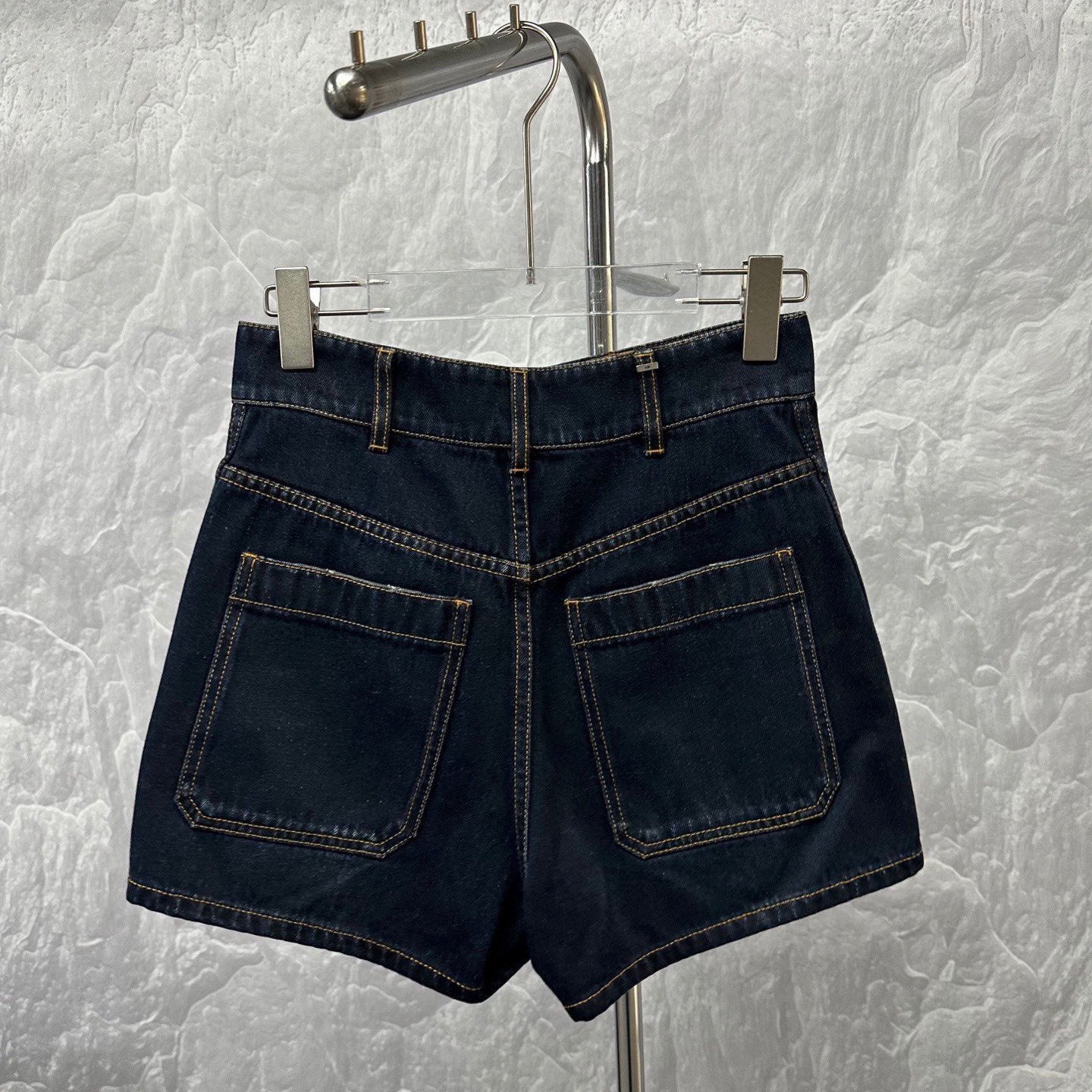 DIOR Washed Distressed Denim Shorts — label
