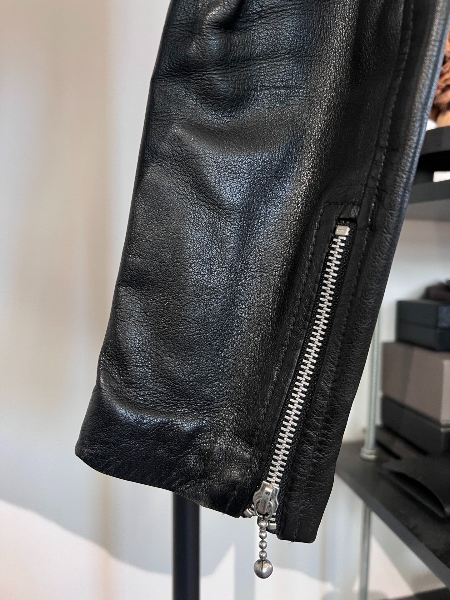 Undercover Leather Sleeve Black Puffer Jacket — label