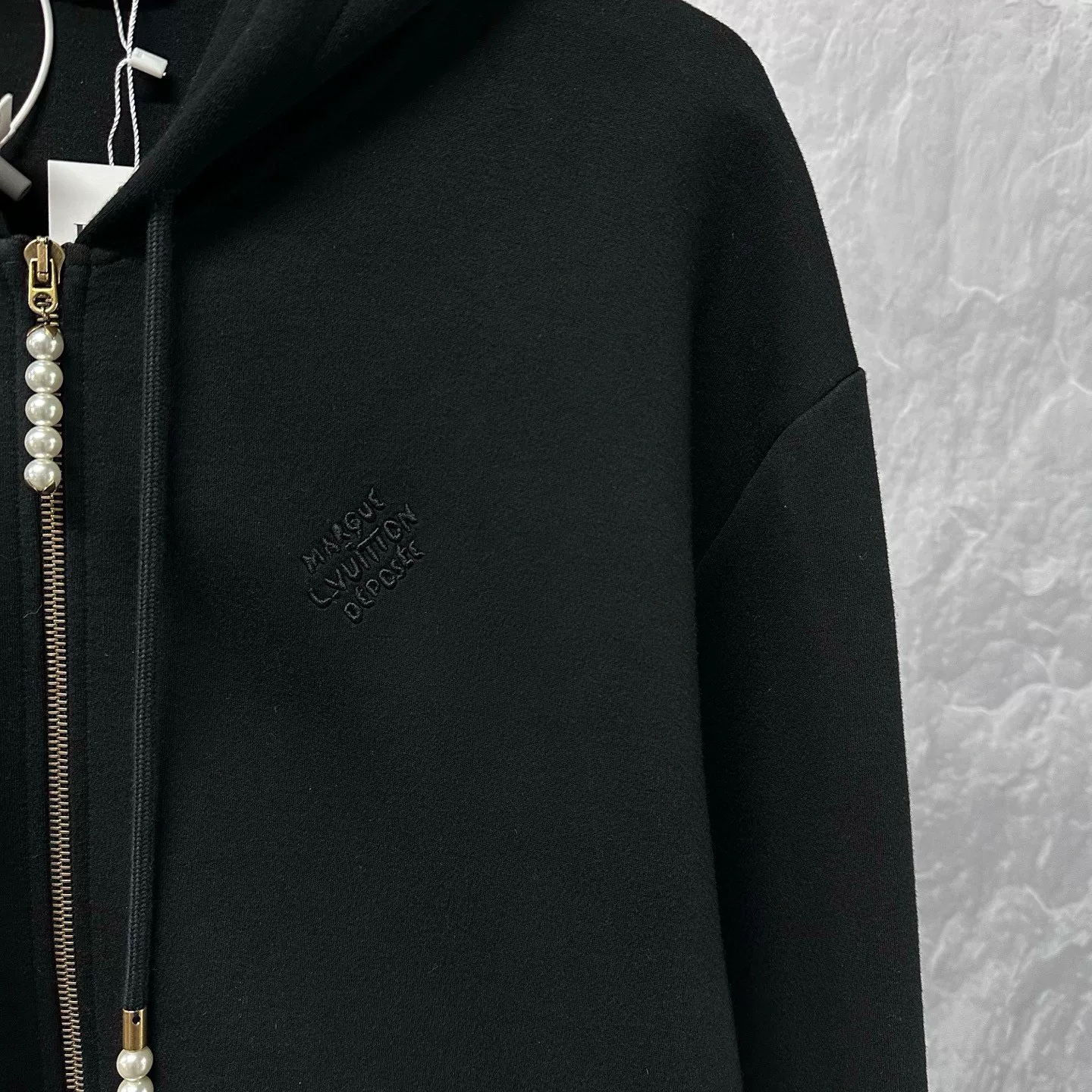Louis Vuitton SS24 Pearl Zip Hooded Jacket — detail