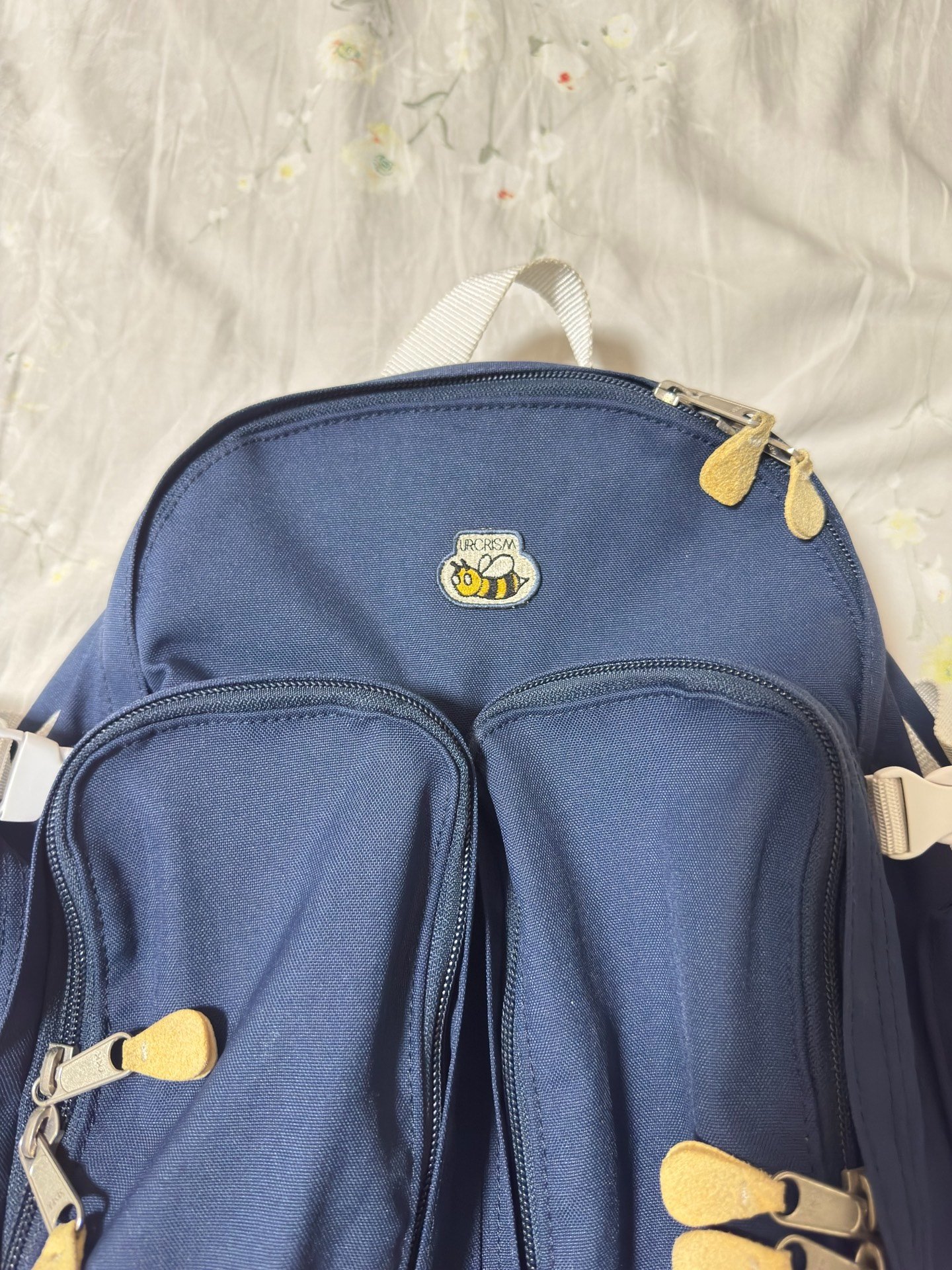 Undercover Multi-Pocket Embroidered Backpack — detail